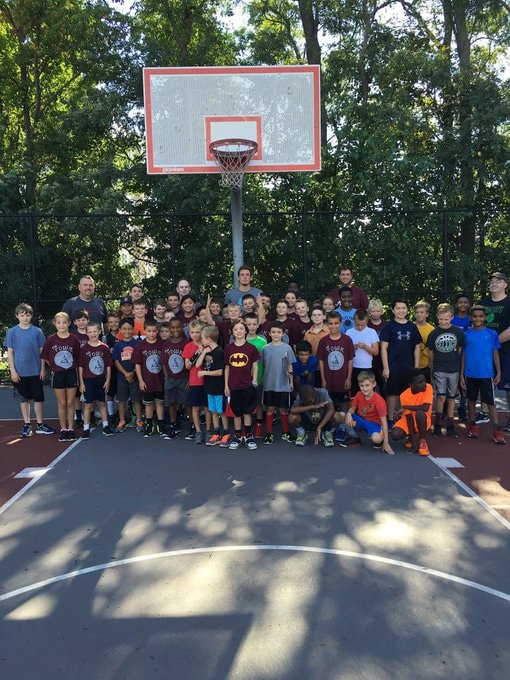 SwishtownARL kids on outdoor basketball court